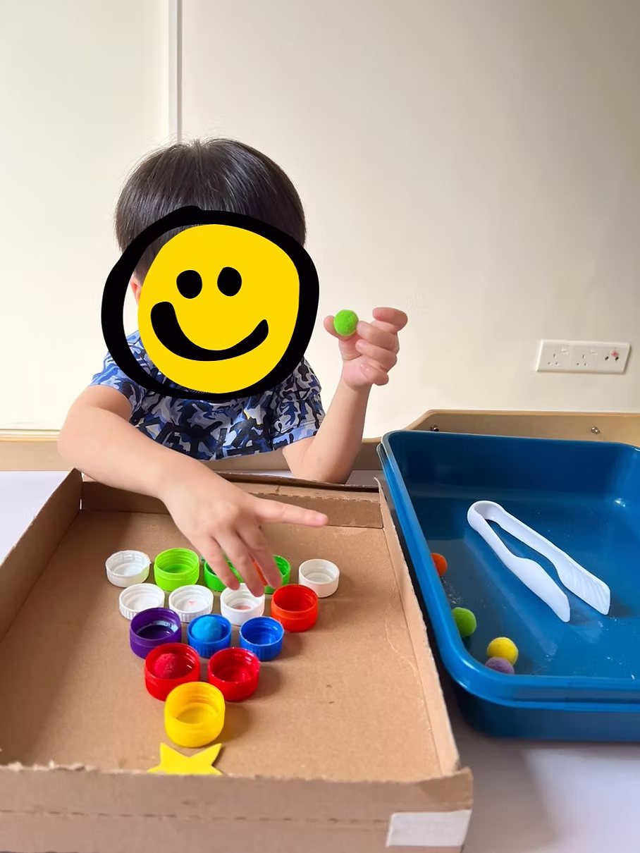 A child taking part in a hands-on learning activity at the centre.